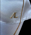 casquette blanche satinee liseret or clear round alexandra ledermann sportswear alsportswear